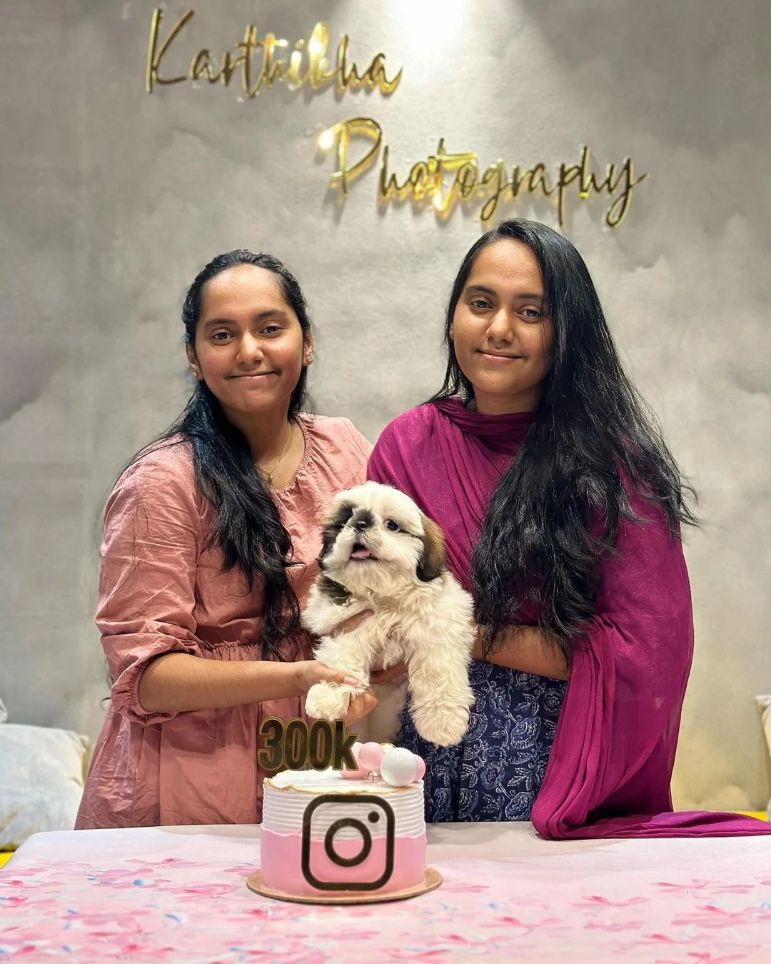 Karthikha and Prathibha at their photography studio entrance in Madurai